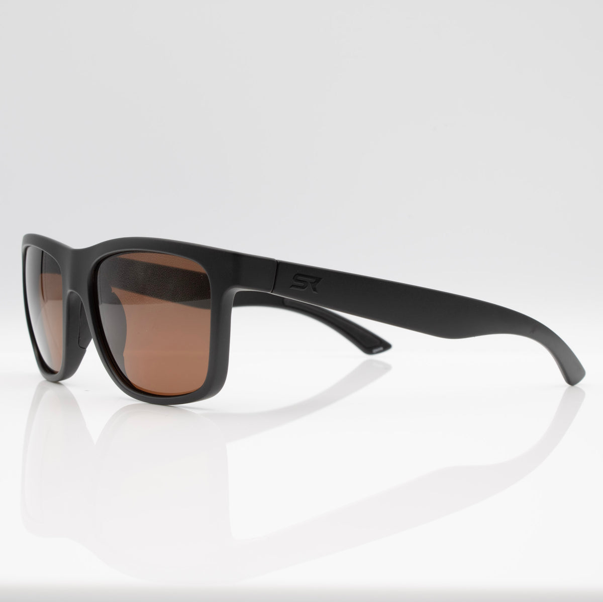 Inverted Blackout Edition sunglasses in Matte Stealth Black with bronze CEVART polycarbonate lenses, clean front view.