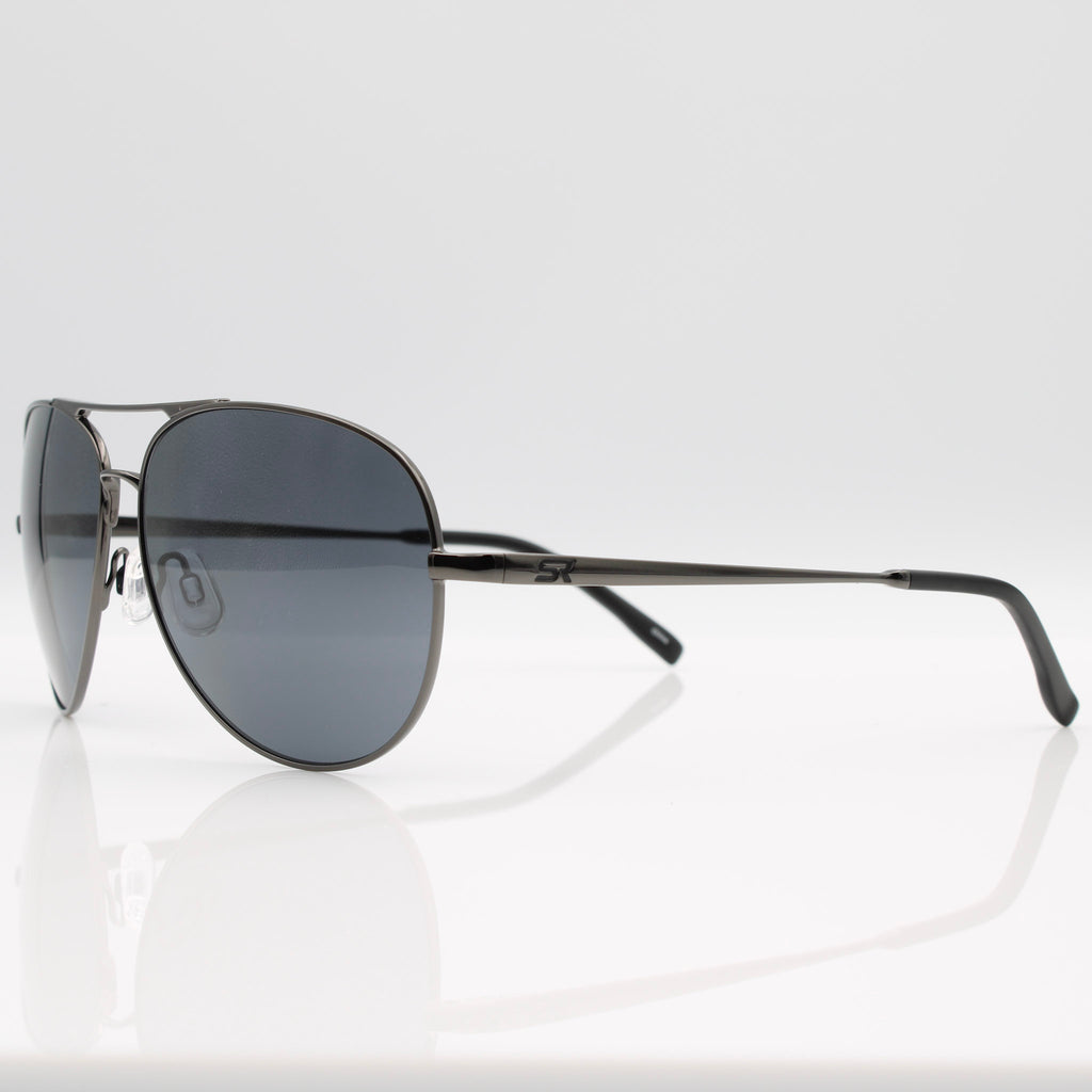 Gunmetal Blackbird Aviator sunglasses with gray lenses, angled side profile showing lightweight metal frame.