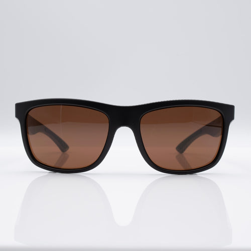 Matte Black Carbon Inverted sunglasses with bronze lenses, angled profile showing carbon-inspired frame detail.