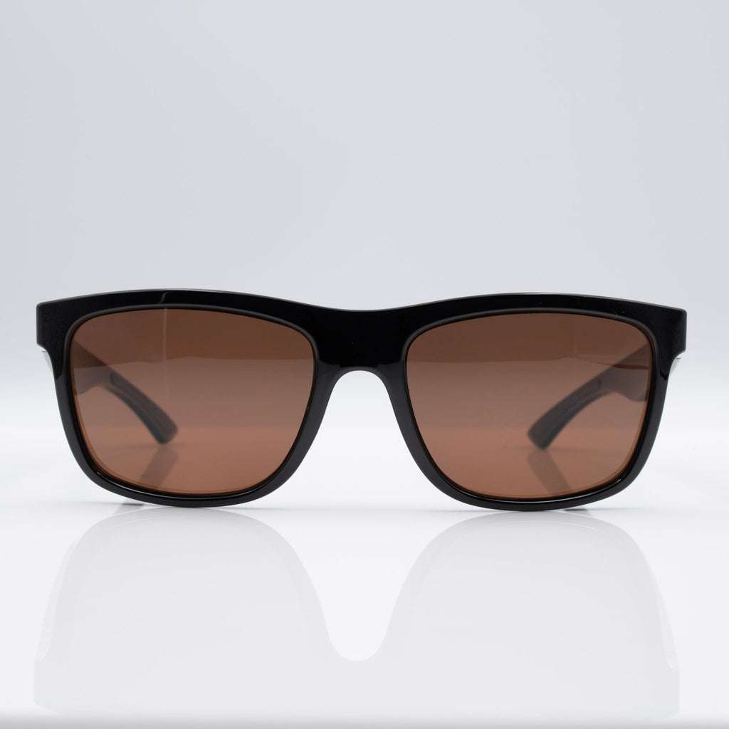Stealth Gloss Black Inverted sunglasses with bronze lenses, angled profile showing glossy blackout frame.