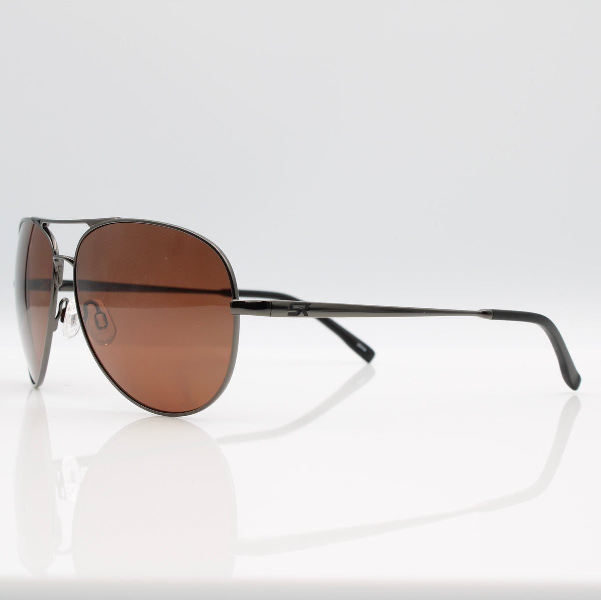 Gunmetal Blackbird Aviator sunglasses with bronze lenses, angled side profile showing lightweight metal frame.