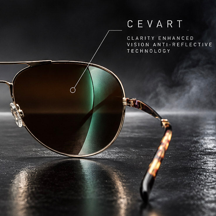 Cevart aviator-style sunglasses with a gold metal frame and dark brown reflective lenses, shown on a dark reflective surface with a smoky background and text reading 'CEVART CLARITY ENHANCED VISION ANTI-REFLECTIVE TECHNOLOGY'.