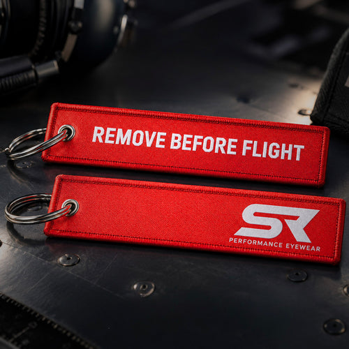 red sr performance eyewear remove before flight keychain